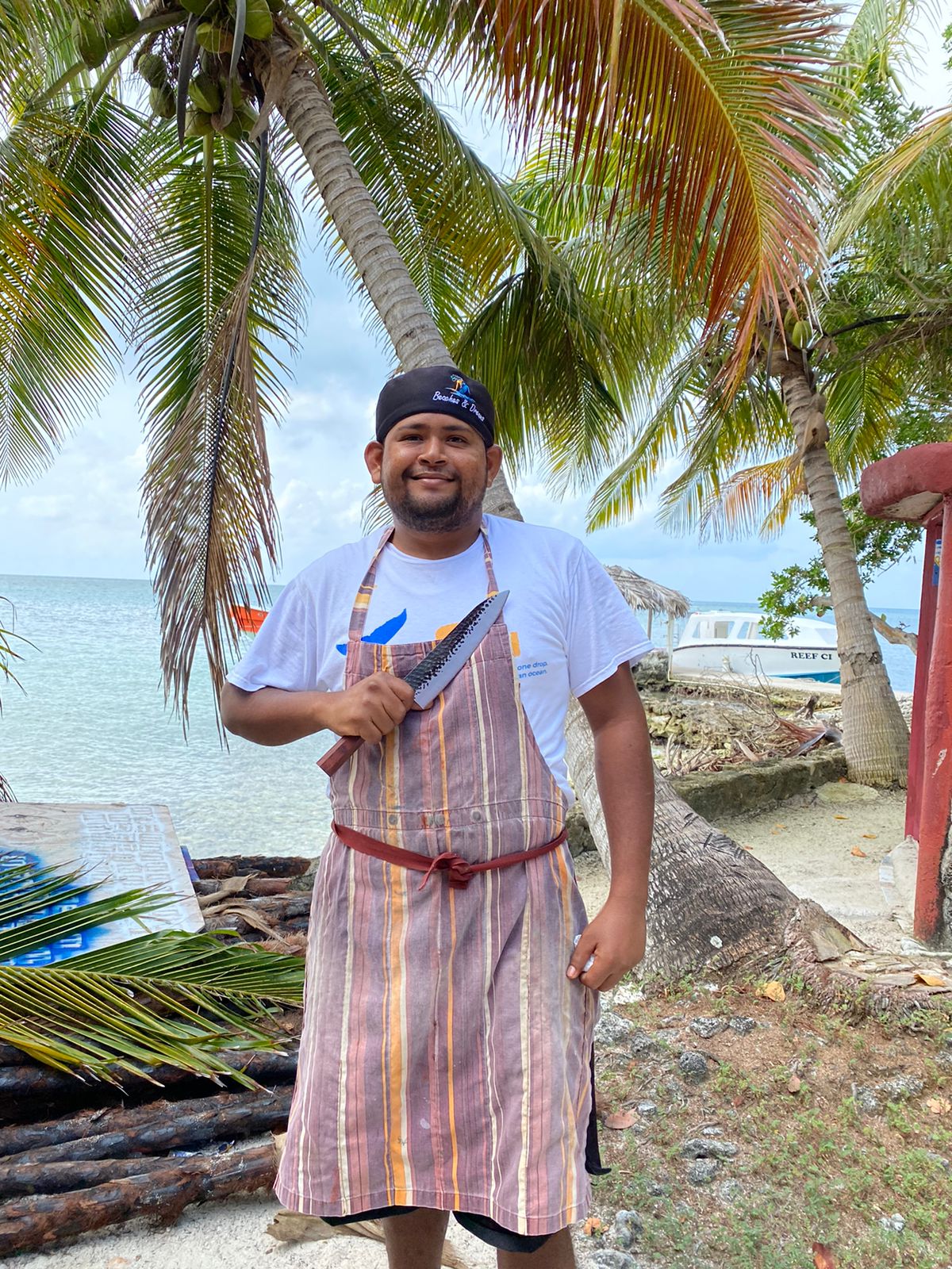 a person standing in front of a palm tree